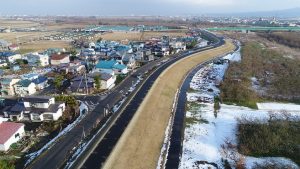 岩木川鶴田左岸東松虫地区築堤工事